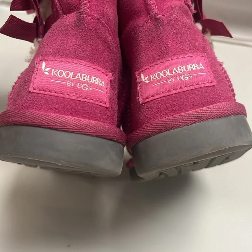 Ugg Koolaburra hit pink booties children size 9 in hot pink with side ribbons